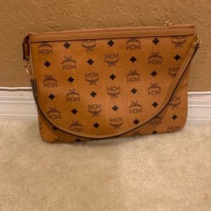 Authentic MCM Pouch. Authenticity card available.